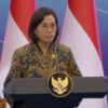 Menteri Keuangan Sri Mulyani Indrawati Saat Memberi Laporan dalam Acara 'Sarasehan Ekonomi Bersama Presiden'